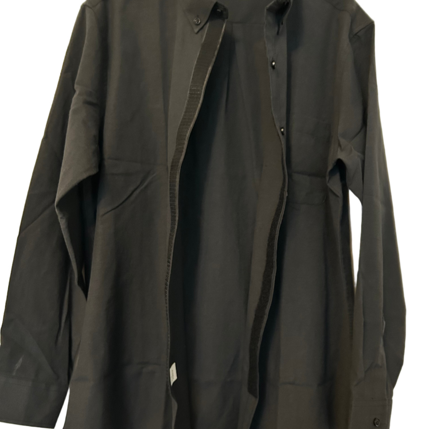 Dark gray shirt on a hanger against a light background