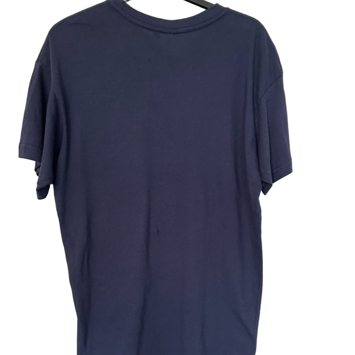 Navy blue t-shirt on a hanger against a white background